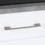 DINO slim zamak handle with a gently curved profile mounted horizontally on a contemporary cabinet drawer.