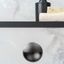 LIDD recessed zamak handle with circular flush design mounted on a contemporary cabinet drawer.