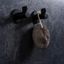 FIN zamak wall hook in Polished Chrome, Matt White or Matt Black with geometric retro design.
