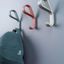 BELT zamak wall hook in Matt White, Matt Black, Moss Grey, Forest Green, Mocca Brown or Volcano Red.