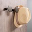FLOID zamak wall hook in Brushed Gold, Antique Brass, Pewter, Matt White or Matt Black.