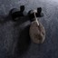 FIN zamak wall hook in Polished Chrome, Matt White or Matt Black with geometric retro design.