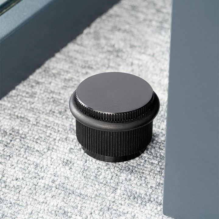 ARPA aluminium door stopper in Stainless Steel Look, Brushed Black, Brushed Dark Brass or Rustic Brass.